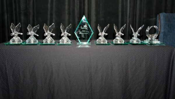 Crystal Eagle awards on table